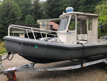Aluminum landing craft on trailer at Juneau boatyard