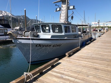 Fishing vessel Ocean Gold docked in Juneau harbor for survey